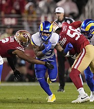 Rams running back Kyren Williams (middle) had 108 yards on the ground against the 49ers.
Mandatory Credit:	Godofredo A. Vásquez/AP via CNN Newsource