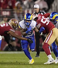 Rams running back Kyren Williams (middle) had 108 yards on the ground against the 49ers.
Mandatory Credit:	Godofredo A. Vásquez/AP via CNN Newsource