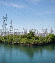 Power lines hang from transmission pylons above a reservoir at the Ontario Power Generation Inc. Sir Adam Beck Generating Station along the Niagara River in Niagara Falls, Ontario, Canada, on May 25, 2018.
Mandatory Credit:	James MacDonald/Bloomberg/Getty Images/File via CNN Newsource