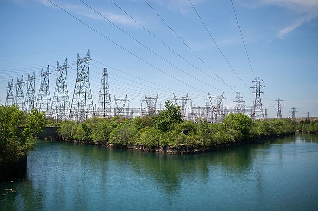 Power lines hang from transmission pylons above a reservoir at the Ontario Power Generation Inc. Sir Adam Beck Generating Station along the Niagara River in Niagara Falls, Ontario, Canada, on May 25, 2018.
Mandatory Credit:	James MacDonald/Bloomberg/Getty Images/File via CNN Newsource