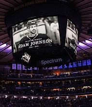 The New York Rangers and the Carolina Hurricanes hold a moment of silence for Adam Johnson prior to their game at Madison Square Garden on November 2, 2023, in New York City.
Mandatory Credit:	Bruce Bennett/Getty Images via CNN Newsource