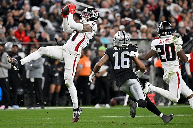 Atlanta Falcons safety Justin Simmons intercepts a pass in the second half against the Las Vegas Raiders.
Mandatory Credit:	David Becker/AP via CNN Newsource