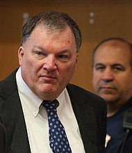 Rex Heuermann, center, charged in the Gilgo Beach serial killings on Long Island, appears for a hearing in July at Suffolk County Court in Riverhead, New York.
Mandatory Credit:	James Carbone/Newsday/AP/File via CNN Newsource