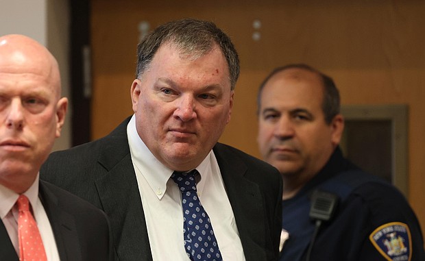 Rex Heuermann, center, charged in the Gilgo Beach serial killings on Long Island, appears for a hearing in July at Suffolk County Court in Riverhead, New York.
Mandatory Credit:	James Carbone/Newsday/AP/File via CNN Newsource