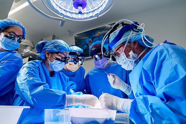 Dr. Robert Montgomery, at right with Looney's transplant team, expects leaps to be made in the field of xenotransplantation.
Mandatory Credit:	Joe Carrotta/NYU Langone Health via CNN Newsource
