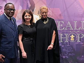 The Rev. W. Franklyn Richardson, chairman of the Conference of National Black
Churches, left, Centers for Disease Control and Prevention Director Mandy Cohen and
CNBC President Jacqui Burton in Orlando, Fla.