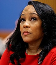 Georgia appeals court disqualifies Fulton County District Attorney Fani Willis, seen here on March 1 in Atlanta from prosecuting President-elect Donald Trump and his alleged co-conspirators in the 2020 election.
Mandatory Credit:	Alex Slitz/Pool/Reuters via CNN Newsource