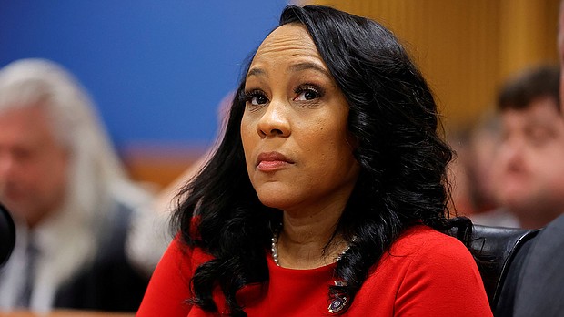 Georgia appeals court disqualifies Fulton County District Attorney Fani Willis, seen here on March 1 in Atlanta from prosecuting President-elect Donald Trump and his alleged co-conspirators in the 2020 election.
Mandatory Credit:	Alex Slitz/Pool/Reuters via CNN Newsource