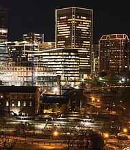 Richmond city lights up for the holidays, as seen from the Belvedere Bridge. The tradition of lighting the skyline returned on Dec. 6.