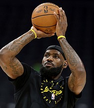 Los Angeles Lakers forward LeBron James warms up prior to an NBA basketball game against the Sacramento Kings in Sacramento, California, on Thursday, December 19.
Mandatory Credit:	Jed Jacobsohn/AP via CNN Newsource