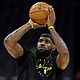 Los Angeles Lakers forward LeBron James warms up prior to an NBA basketball game against the Sacramento Kings in Sacramento, California, on Thursday, December 19.
Mandatory Credit:	Jed Jacobsohn/AP via CNN Newsource