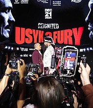 Oleksandr Usyk and Tyson Fury face off during a press conference in Riyadh, Saudi Arabia.
Mandatory Credit:	Nick Potts/PA Images/Getty Images via CNN Newsource