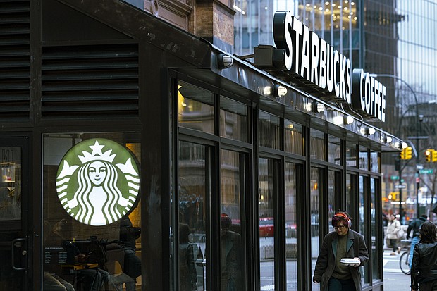 The Starbucks Workers United union started a strike in three cities - Seattle, Chicago and Los Angeles - on Friday, December 20.
Mandatory Credit:	Angus Mordant/Bloomberg via Getty Images via CNN Newsource