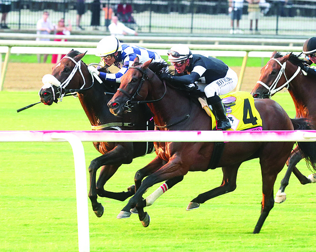 Jockey Jose Ortiz rides thoroughbred Moira to a close victory at Colonial Downs’ Festival of Racing in August. Racing season returns on March 13.