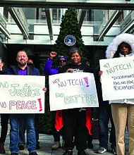 Custodians rally outside Richmond City Hall, holding picket signs to demand justice
following allegations of retaliatory firings and disability discrimination by Nu-Tech
Janitorial Services.
