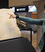 Sharon Liberman Mintz, Sotheby’s Judaica specialist for books and manuscripts, discusses the oldest complete tablet of the Ten Commandments, a 115-pound artifact more than 1,700 years old, sold at Sotheby’s in New York on Dec. 18.
