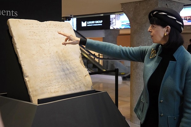 Sharon Liberman Mintz, Sotheby’s Judaica specialist for books and manuscripts, discusses the oldest complete tablet of the Ten Commandments, a 115-pound artifact more than 1,700 years old, sold at Sotheby’s in New York on Dec. 18.