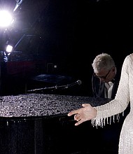 Celine Dion performing at the Eiffel Tower during the opening ceremony of the 2024 Olympic Games in Paris in July.
Mandatory Credit:	Olympic Broadcasting Services via Reuters via CNN Newsource