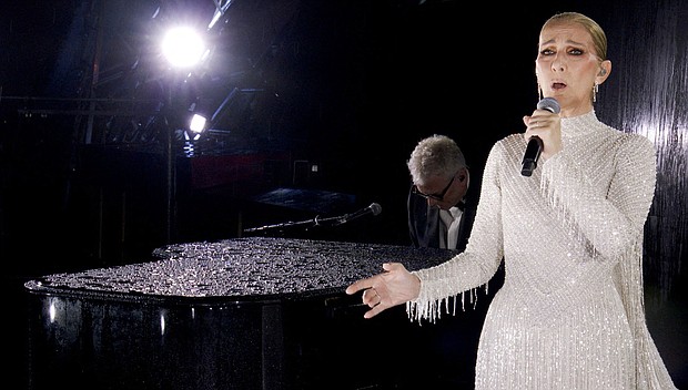 Celine Dion performing at the Eiffel Tower during the opening ceremony of the 2024 Olympic Games in Paris in July.
Mandatory Credit:	Olympic Broadcasting Services via Reuters via CNN Newsource