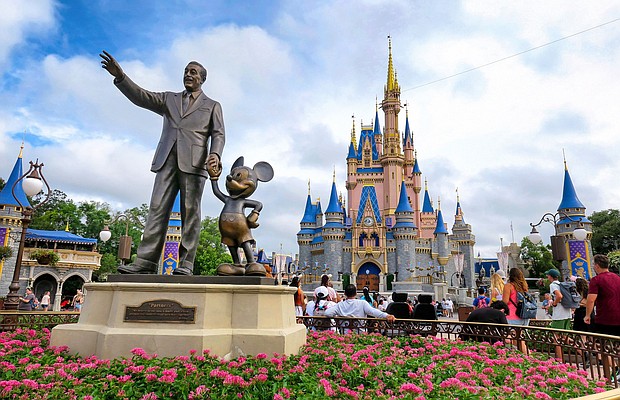 The "Partners" statue of Walt Disney and Mickey Mouse is in front of Cinderella Castle at the Magic Kingdom at Walt Disney World. Disney is making a concerted effort to add simplicity to its park offerings.
Mandatory Credit:	Joe Burbank/Orlando Sentinel/Tribune News Service/Getty Images via CNN Newsource