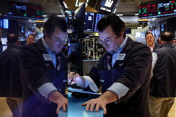 US stocks dropped Monday, with the Dow falling by more than 300 points as markets close out a record year.