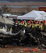 Rescue workers take part in a salvage operation at the site where an aircraft crashed after it went off the runway at Muan International Airport, in Muan, South Korea, on December 29, 2024.
Mandatory Credit:	Kim Hong-Ji/Reuters via CNN Newsource
