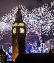 Fireworks light up the London skyline over Big Ben and the London Eye just after midnight on January 1, 2023 in London, England. London's New Years' Eve firework display returned this year after it was cancelled during the Covid Pandemic.
Mandatory Credit:	Dan Kitwood/Getty Images via CNN Newsource