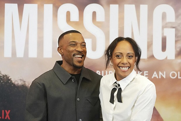 Actors Ashley Walters, left, and Rosalind Eleazar pose for photographers at a event for the television series “Missing You” last November in London.