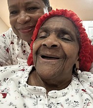Hazel Trice Edney embraces her mother, gospel singer Marie Trice.