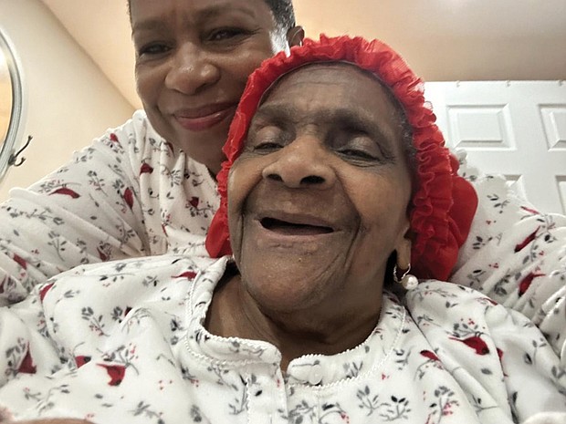 Hazel Trice Edney embraces her mother, gospel singer Marie Trice.