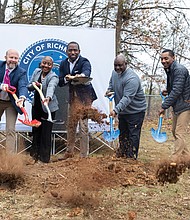 The James River Branch Trail took a big step forward with a groundbreaking ceremony Dec. 10 at Westover Hills Boulevard and Crutchfield Street. Pictured (from left): Jon Lugbill, executive director of Sports Backers; Chris Frelke, director of parks and recreation; Traci J. Deshazor, deputy chief administrative officer for human services; former Mayor Levar Stoney; Bobby Vincent Jr., director of public works; Andrew Alli, trails and greenways superintendent; and Ryan Rinn, capital projects planner. The 2-mile, multi-use trail will connect Westover Hills Boulevard to Hopkins Road, offering a safe route for biking and walking and enhancing access to South Side neighborhoods. Construction begins in the spring, with completion expected by December 2026.