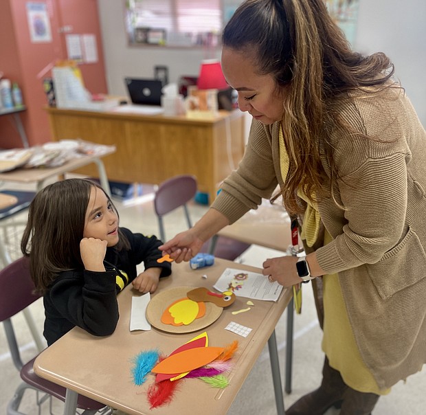 CIS of Houston support manager with student/
Photo credit: Courtesy of Communities In Schools of Houston.