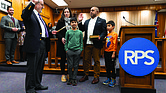 Ali Faruk, was sworn in as a new Richmond City School Board member representing the 3rd district at City Hall on Wednesday, January 8, 2025. With him is his wife Samieh and his two sons Yusef and Zayn. Faruk is a new school board member along with 4 other new members and 4 returning board members. (Julianne Tripp HIllian/ Richmond Free Press)