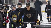 Maryland Black Bears junior player Kareem El-Bashir instructing players on the ice during the
Washington Capitals’ Rising Stars Academy in 2023.