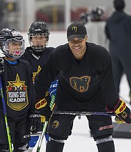 Maryland Black Bears junior player Kareem El-Bashir instructing players on the ice during the
Washington Capitals’ Rising Stars Academy in 2023.