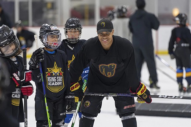 Maryland Black Bears junior player Kareem El-Bashir instructing players on the ice during the
Washington Capitals’ Rising Stars Academy in 2023.
