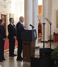 President Joe Biden, right, with Vice President Kamala Harris, left, and Secretary of State Antony Blinken, center, speaks in the Cross Hall of the White House on the announcement of a ceasefire deal in Gaza.
Mandatory Credit:	Evan Vucci/AP via CNN Newsource