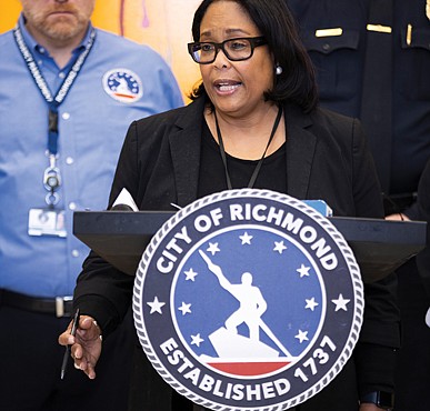 April Bingham, former director of the Department of Public Utilities, speaks at a news conference Wednesday, Jan. 8, at City Hall.