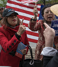 Supporters of then-President Donald Trump, left and center, argue with anti-Trump protesters on May 4, 2017, in New York City. Robert Nickelsberg/Getty Images