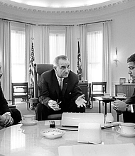 Martin Luther King Jr., President Lyndon Johnson, Whitney Young and James Farmer, from left, discuss civil rights in the Oval Office of the White House on January 18, 1964. GHI/Universal Images Group via Getty Images