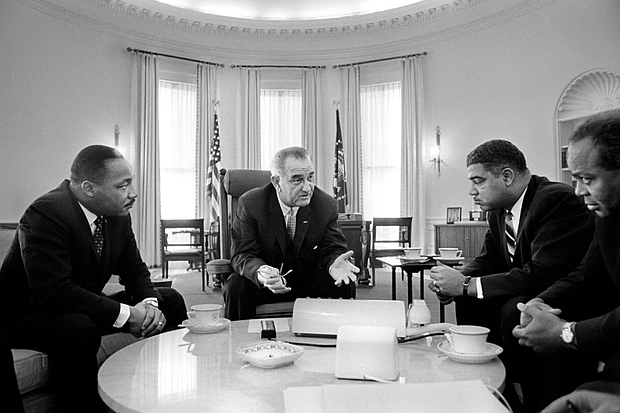 Martin Luther King Jr., President Lyndon Johnson, Whitney Young and James Farmer, from left, discuss civil rights in the Oval Office of the White House on January 18, 1964. GHI/Universal Images Group via Getty Images