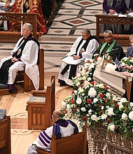 The Right Rev. Mariann Budde, right, the Episcopal bishop of Washington, preaches Jan. 21 during the national prayer service at the Washington National Cathedral.