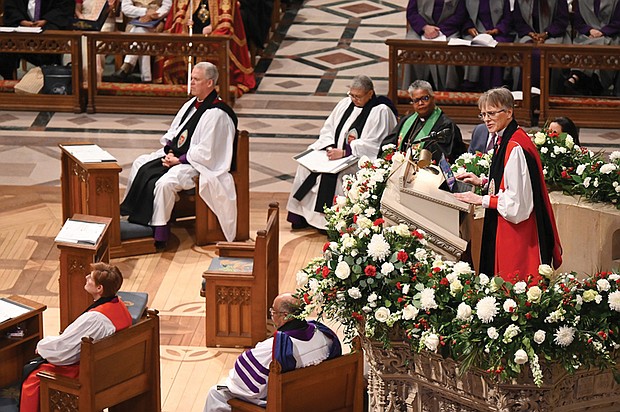 The Right Rev. Mariann Budde, right, the Episcopal bishop of Washington, preaches Jan. 21 during the national prayer service at the Washington National Cathedral.