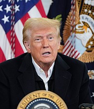 President Donald Trump is briefed on the effects of Hurricane Helene in Fletcher, North Carolina on January 24, 2025.
Mandatory Credit:	Mark Schiefelbein/AP via CNN Newsource