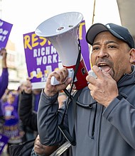 Jaime Contreras, executive vice president of 32BJ’s Capital Area District, led about 150 union workers in protest chants outside the Nu-Tech Janitorial Services building on Tuesday morning, Jan. 28. The demonstration supported Richmond janitors who went on strike over charges that the company illegally terminated three workers and threatened another for attempting to unionize.