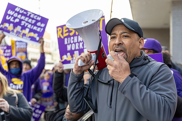 Jaime Contreras, executive vice president of 32BJ’s Capital Area District, led about 150 union workers in protest chants outside the Nu-Tech Janitorial Services building on Tuesday morning, Jan. 28. The demonstration supported Richmond janitors who went on strike over charges that the company illegally terminated three workers and threatened another for attempting to unionize.