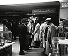 Richmond police attempt to move Virginia Union University students out of a restaurant in Thalhimers department store downtown where they refused to leave, protesting the white-only policy for service.