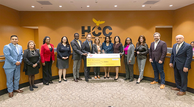 HCC Chancelor Dr.Ford, HCC Foundation Board Rick Jaramillo BofA,Patti Abshire BofA with others