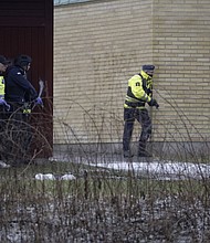 Police at the scene of a shooting at a school in Örebro, central Sweden, on February 4. Authorities urged members of the public to stay away from the area on Tuesday.
Mandatory Credit:	Kicki Nilsson/TT News Agency/AFP/Getty Images via CNN Newsource