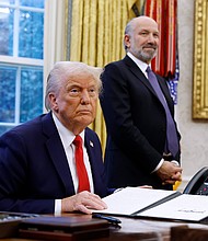 President Donald Trump, alongside Howard Lutnick, his nominee for Commerce Secretary, speaks to reporters in the Oval Office of the White House on February 3, in Washington.
Mandatory Credit:	Anna Moneymaker/Getty Images via CNN Newsource